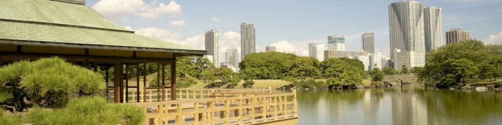 tokyo japan ancient temples nestled beside neon-lit skyscrapers