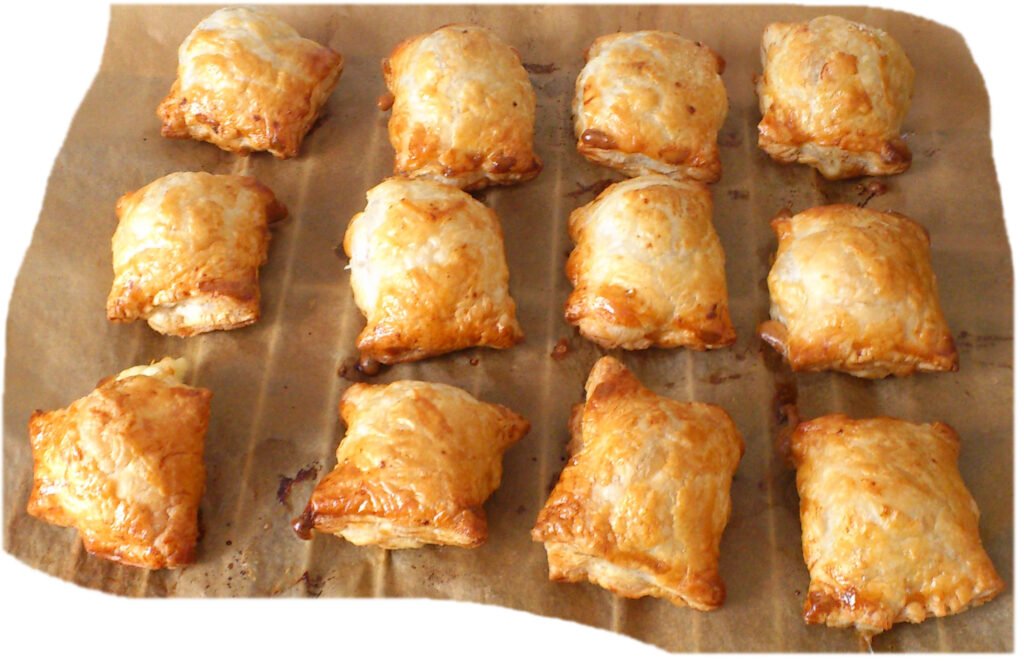 the savory aroma of fresh pirozhki in a hidden bakery
